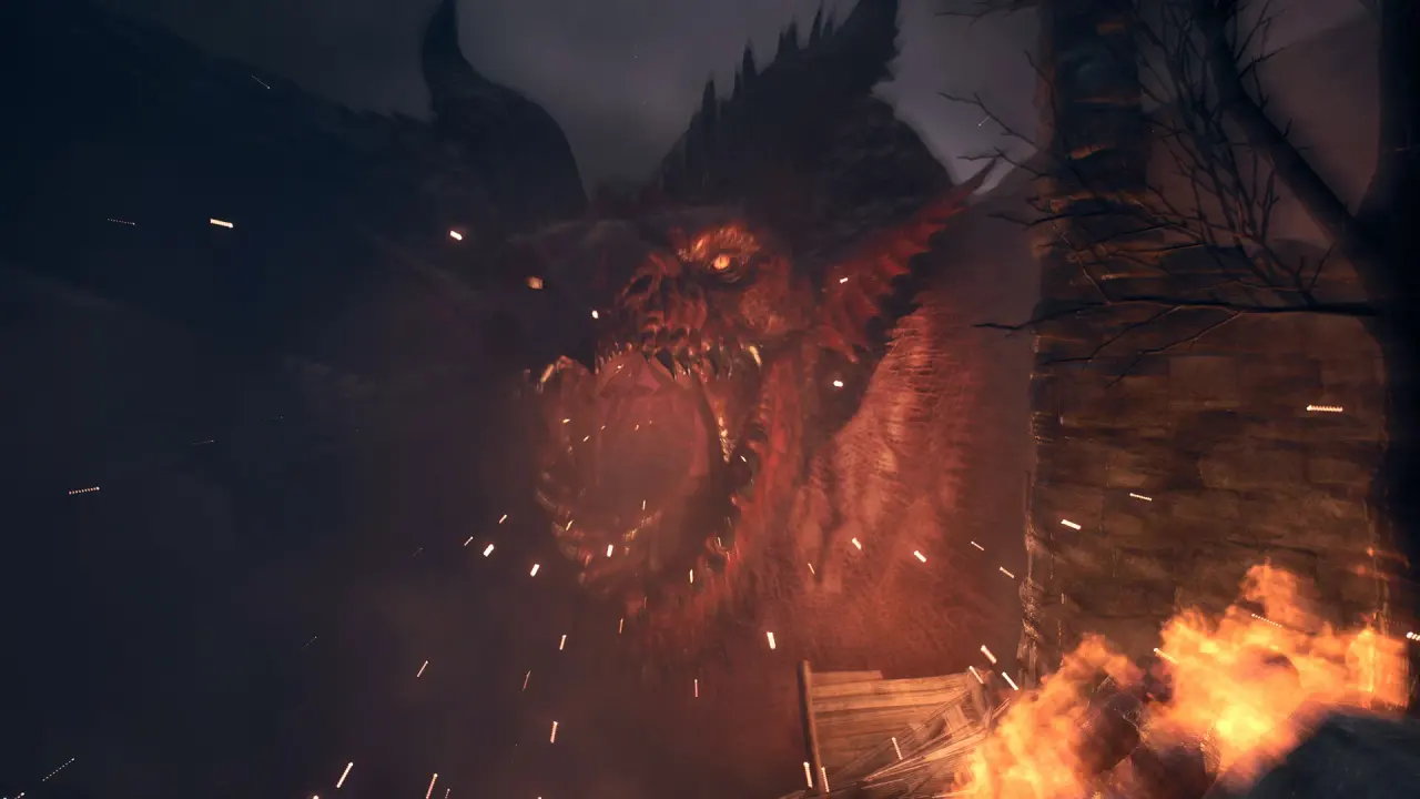 A red dragon roaring beside a stone wall while a fire burns in the foreground.